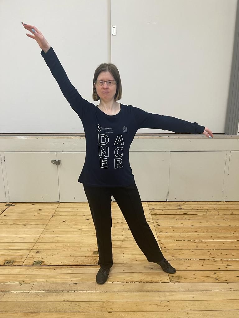 Jen Blackwell demonstrating a dance pose. Image provided by DanceSyndrome.