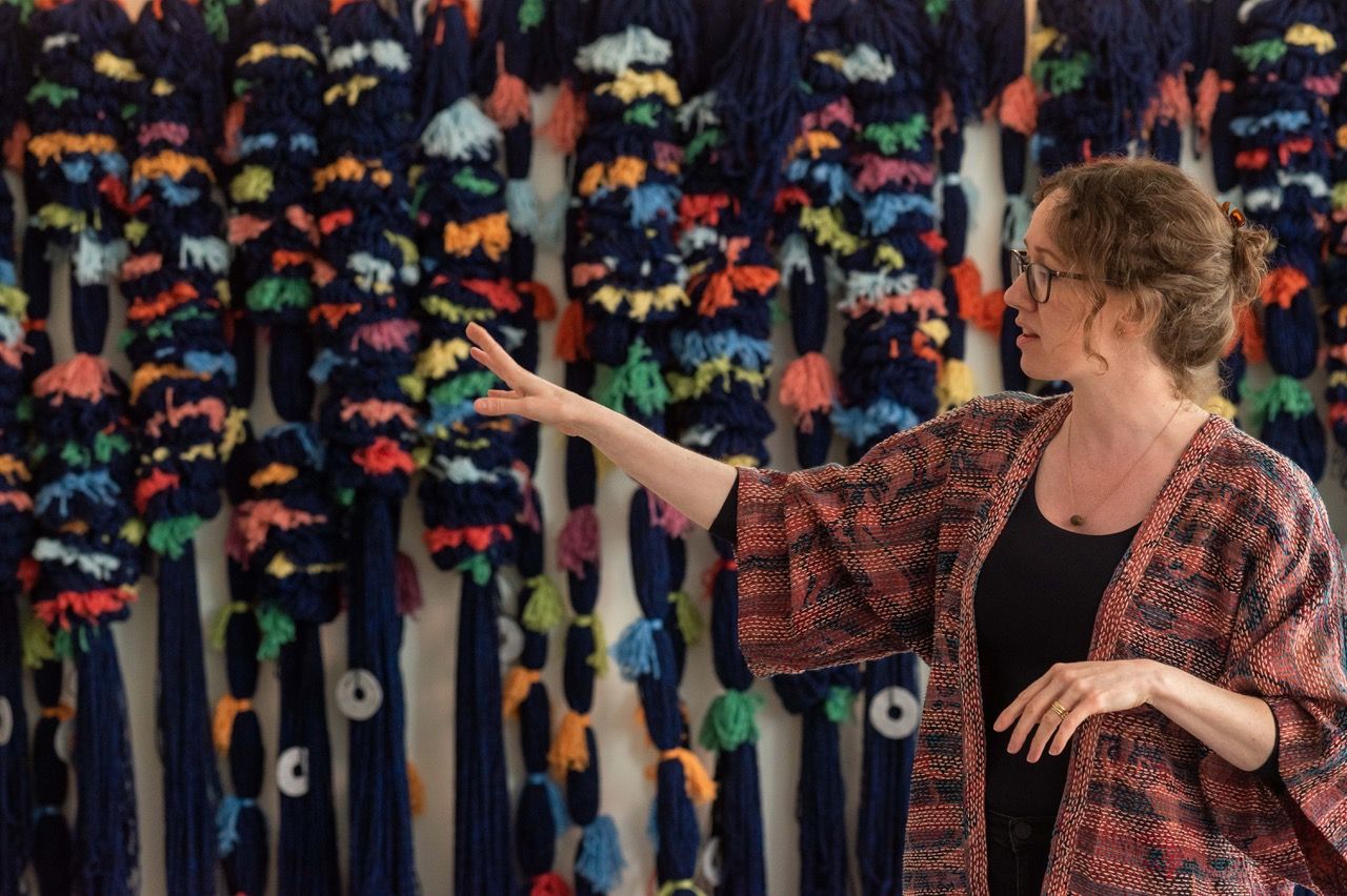 Anna Ray in front of one of her textile pieces featured at Festival of Making in 2019