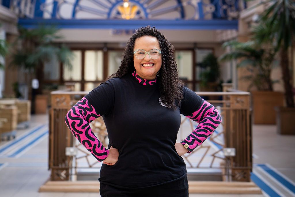 Catherine Mugonyi in a black and pink shirt at the Winter Gardens. Photo by Rachel Ovenden.