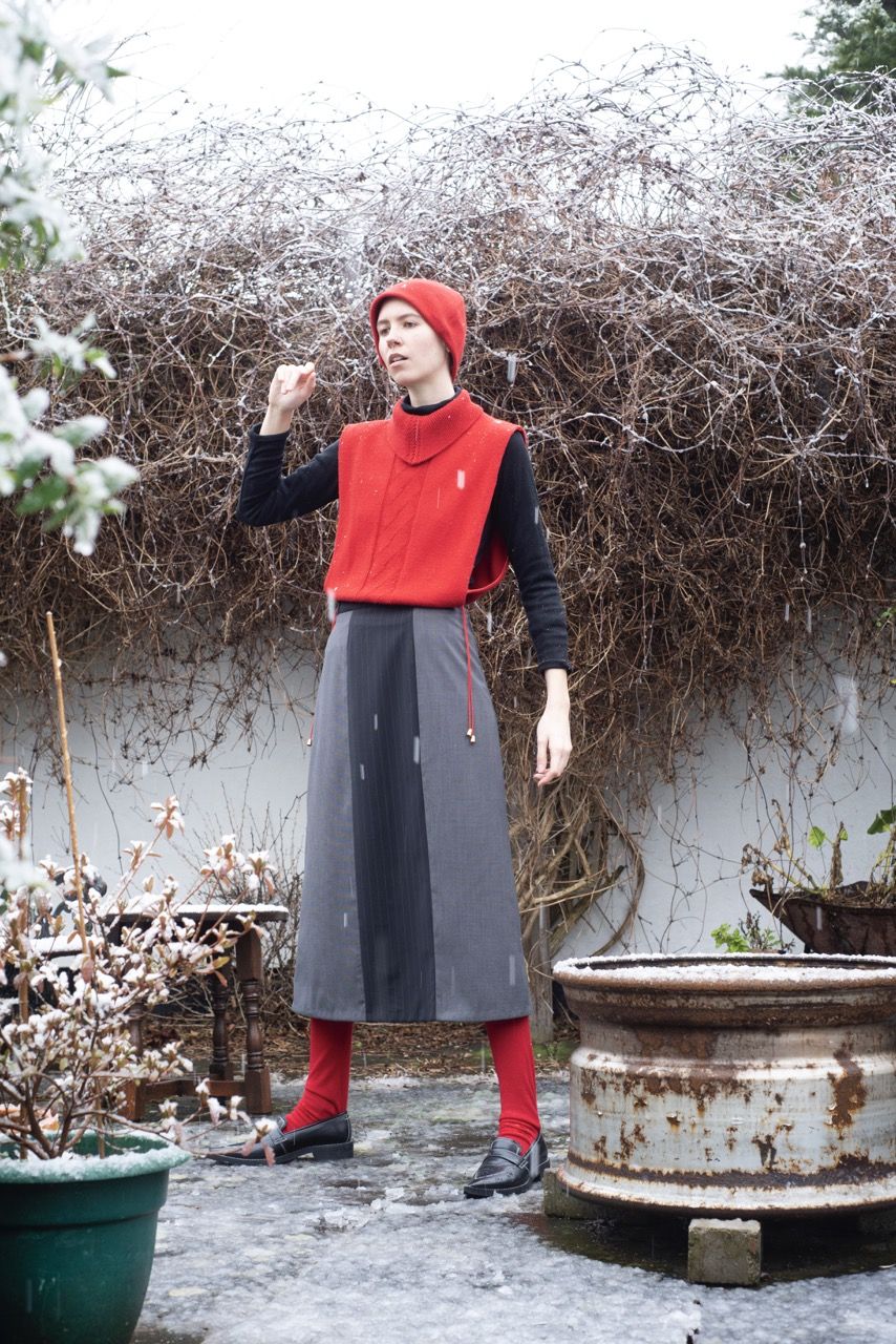 Angy Young's Convert Fashion range, model wearing red and grey. Image credit Sally Sharpe.