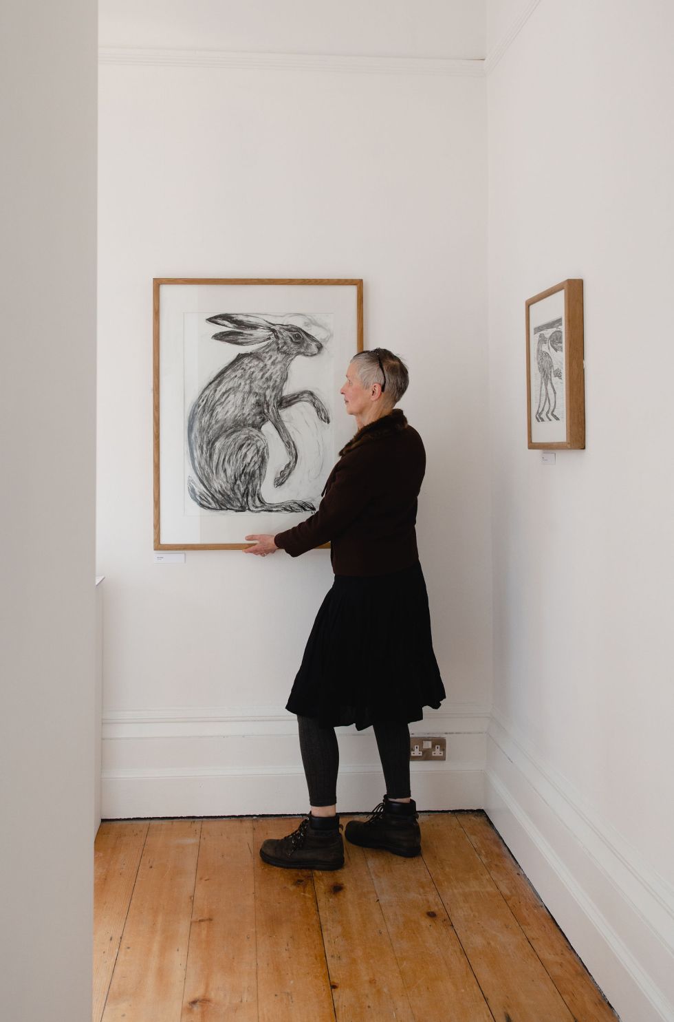 Marjan Wouda with her Hare illustration on display at The Whitaker Gallery. Image by Christina Davies, Fish2Photo