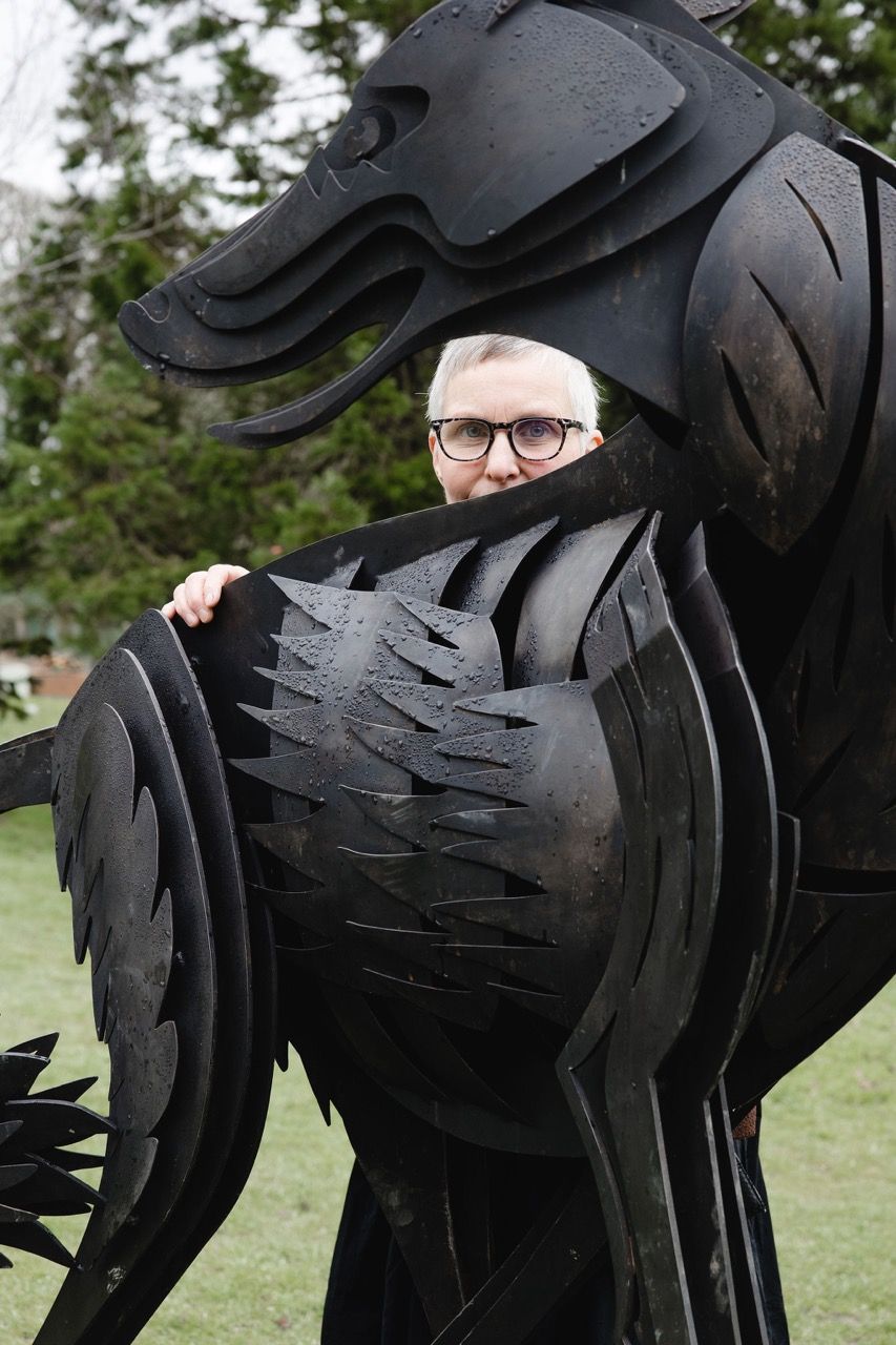 Marjan Wouda with her wolf scupture on display at Whitaker Museum. Image by Christina Davies